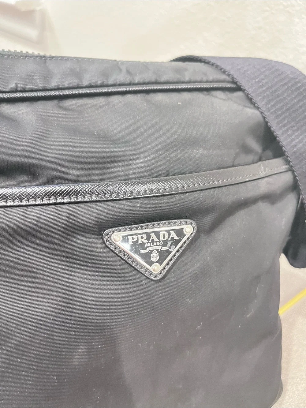 PRADA TESSUTO NYLON AND SAFFIANO LEATHER MESSENGER BAG.